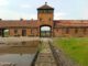 Gate to Auschwitz I with its Arbeit macht frei sign ("work sets you free") © wikipedia